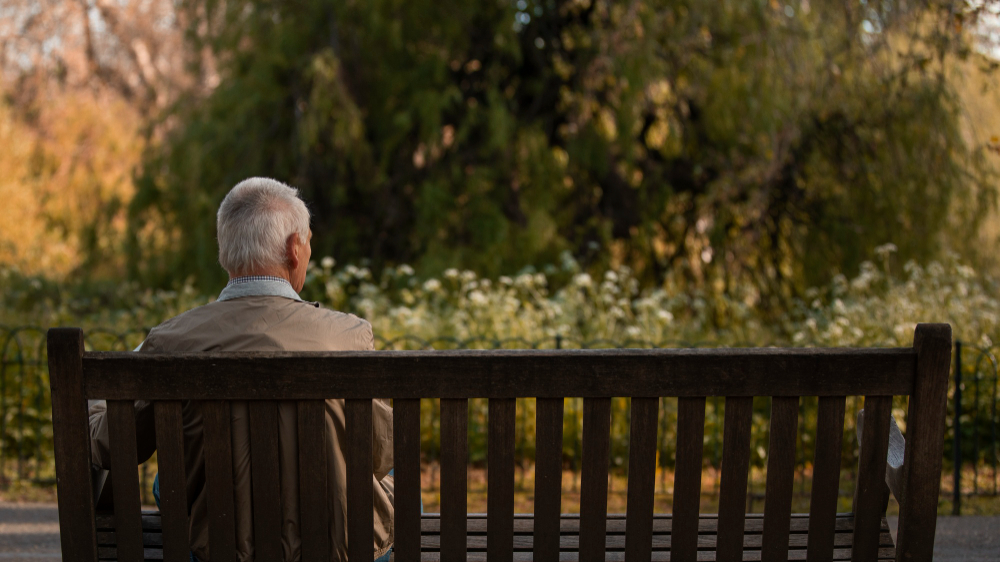 man on bench ()